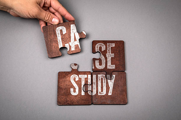 istock Hand Assembling Wooden Puzzle Pieces with Text Case Study Representing Research and Business Analysis Concept 2243016785