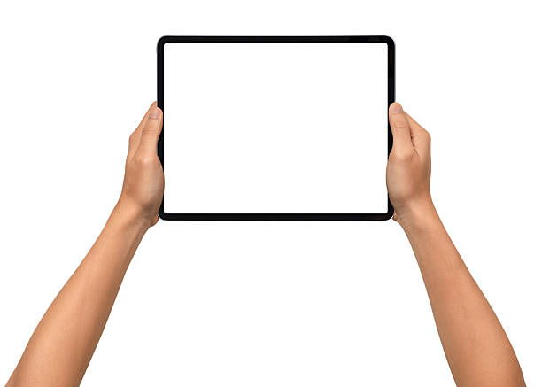 istock Close-up of hands holding a modern tablet with blank screen isolated on white background. High quality studio shot. Concept for technology, business, finance, advertising and public relations. 2243016794