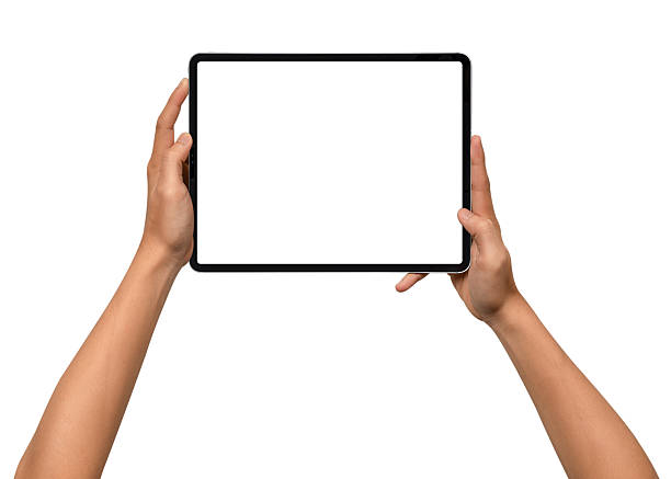 istock Close-up of hands holding a modern tablet with blank screen isolated on white background. High quality studio shot. Concept for technology, business, finance, advertising and public relations. 2243016829