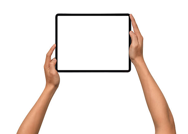 istock Close-up of hands holding a modern tablet with blank screen isolated on white background. High quality studio shot. Concept for technology, business, finance, advertising and public relations. 2243016833