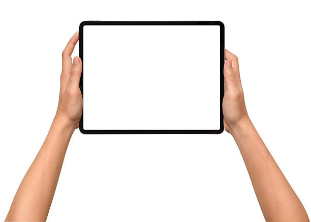 istock Close-up of hands holding a modern tablet with blank screen isolated on white background. High quality studio shot. Concept for technology, business, finance, advertising and public relations. 2243016876
