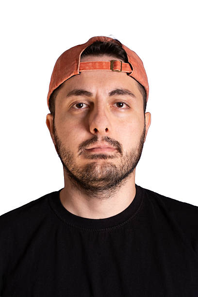Close‑up portrait of young bearded man looking at camera