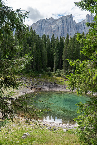 istock Lago di Carezza (Karersee) emerald lake with Latemar mountains, Dolomites, Italy 2243023201