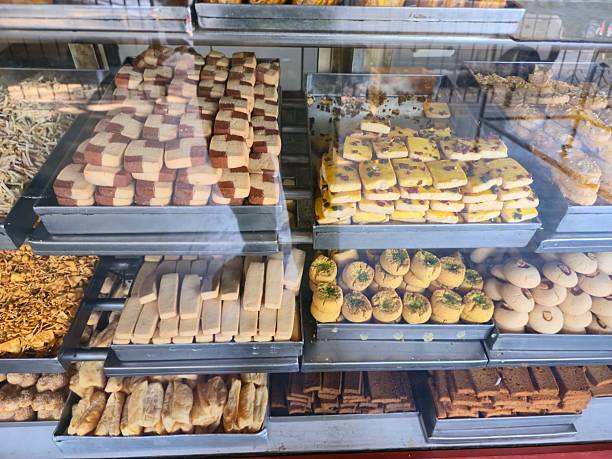 istock Assorted bakery biscuits and pastries displayed in glass counter at shop 2243028808