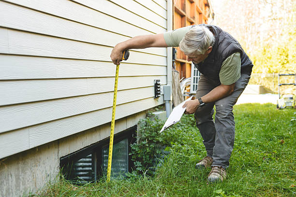 istock inspector or engineer is checking the building structure and house. After the renovate is complete 2243029808