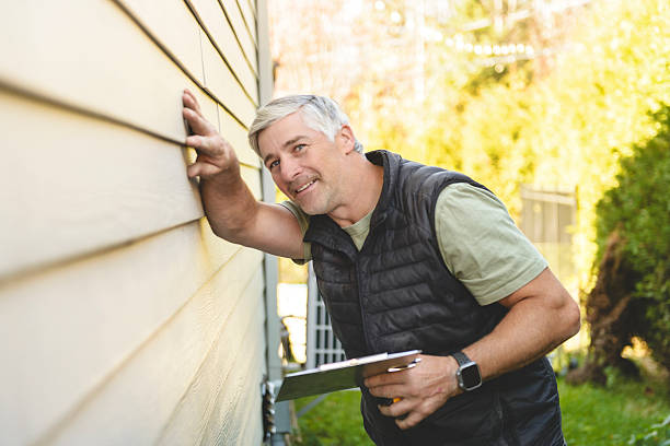 istock inspector or engineer is checking the building structure and house. After the renovate is complete 2243030080