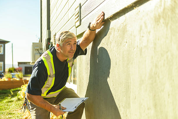 istock inspector or engineer is checking the building structure and house. After the renovate is complete 2243032948