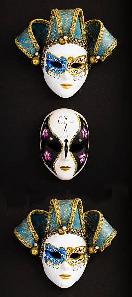 istock Venetian carnival masks on a black blackground. Top view. 2243033429