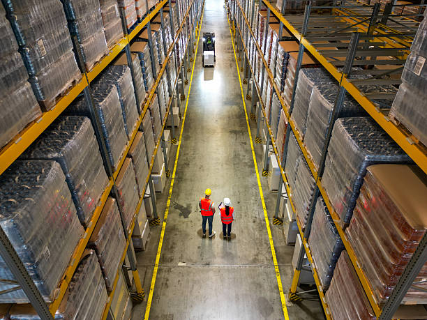 istock Supply Chain Stuff and Forklift in Storage Aisle 2243033786