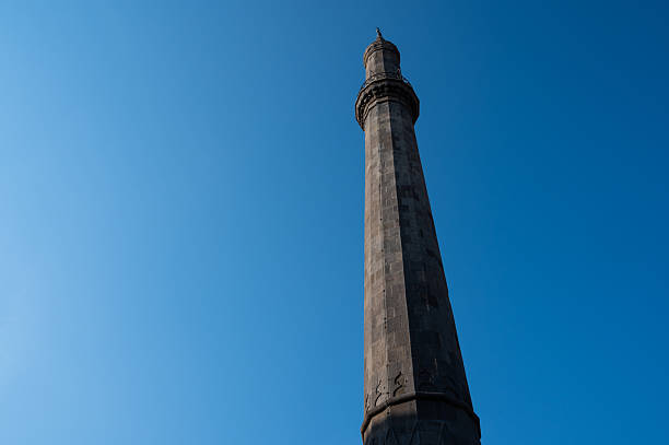A close-up view of the historic Eger Minaret in Hungary rises against a vivid blue sky. This beautifully preserved Ottoman-era structure stands as a symbol of the city’s diverse cultural heritage and architectural history.