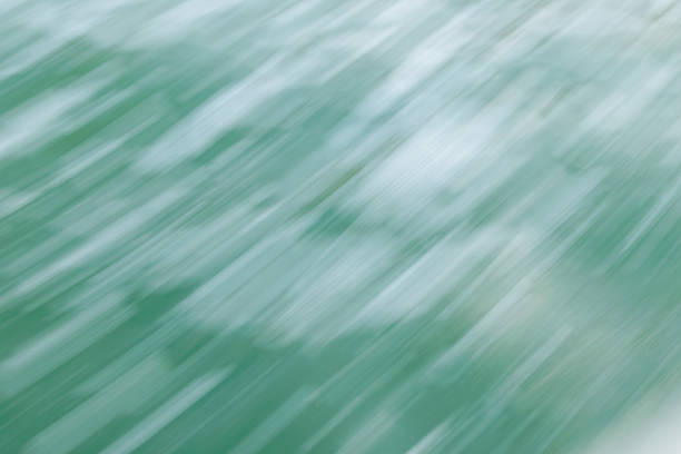 Calm ocean water surface with gentle ripples and bubbles