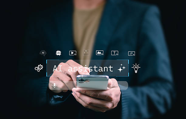 istock Businessman using AI assistant interface with futuristic digital icons, representing artificial intelligence technology for automation, search, and productivity in business and daily tasks. Smart AI 2243044289