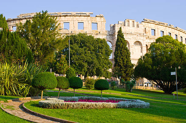 Explore the stunning Pula Arena, a magnificent ancient Roman amphitheater in Croatia. Perfect for travel, history, and architectural projects.