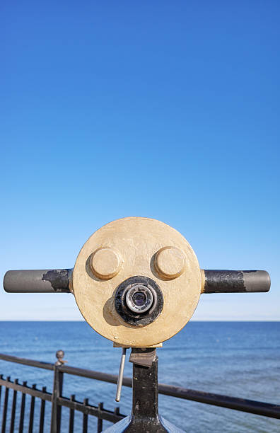 istock Viewing scope at a viewpoint facing the sea, selective focus. 2243055098