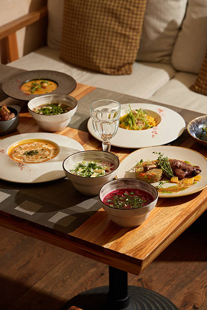 istock Savoring Delicious and Flavorful Dishes Beautifully Served on a Rustic Table Setting 2243055558
