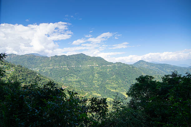 istock White clouds on blue sky over Himalayan mountains, Sikkim, India. 2243059655