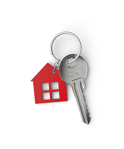 istock House key with red keychain on white background 2243070824