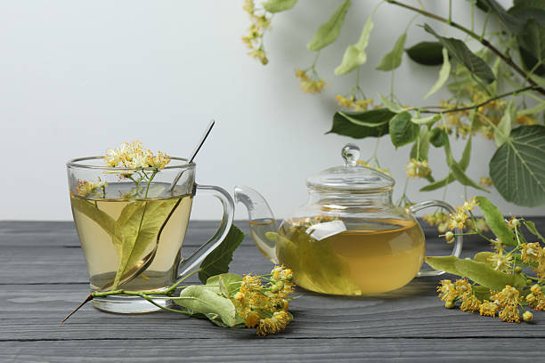 istock linden tea linden flowers, a cup with space for text 2243074361