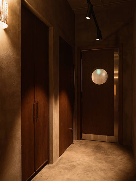 istock An Elegant Hallway decorated with Doors and enhanced by Soft Ambient Lighting throughout 2243075541