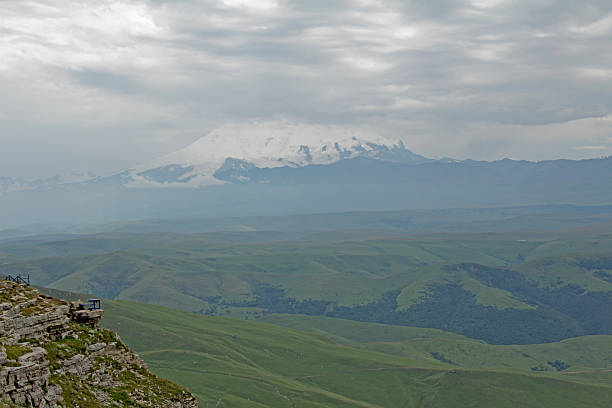 Elbrus from afar. The mountain in the clouds.