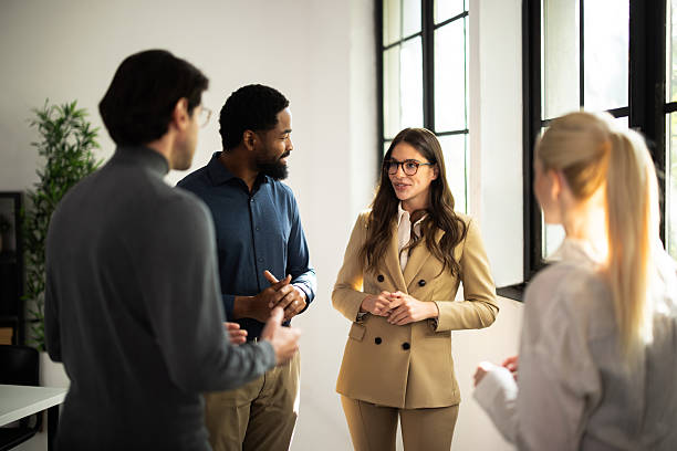 istock Business colleagues collaborating and discussing ideas in modern office 2243082563
