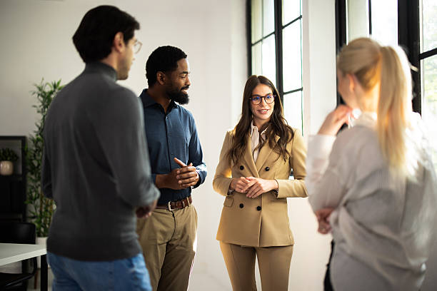 istock Diverse business professionals discussing work during a casual meeting 2243082759