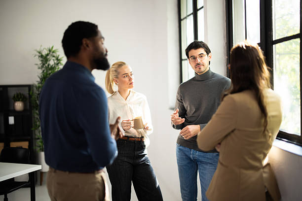 istock Diverse business colleagues discussing ideas in office meeting 2243082768