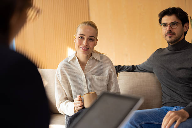 istock Young couple receiving advice during a professional consultation 2243083090