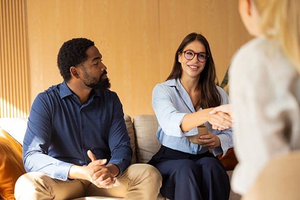 istock Businesswoman shaking hands with client during meeting 2243083097