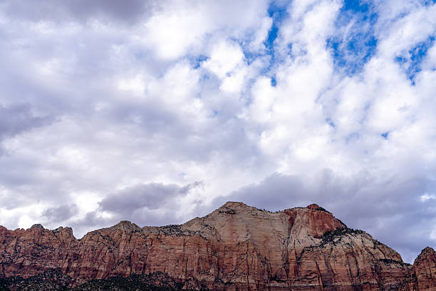 istock Dramatic clouds gather over Zion National Park's sandstone cliffs. 2243084910