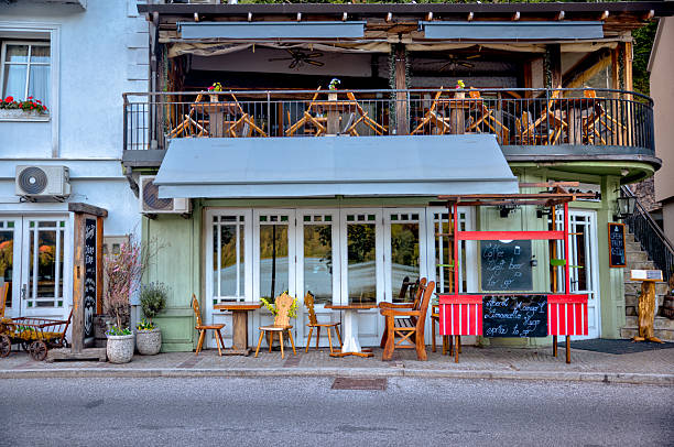 Lake Bled, Slovenia – July 17, 2025: Traditional buildings along the road that circles Lake Bled