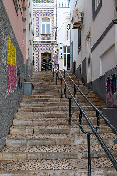 Looking up Rua das Escadinhas in the old town area of Lagos in Portugal.