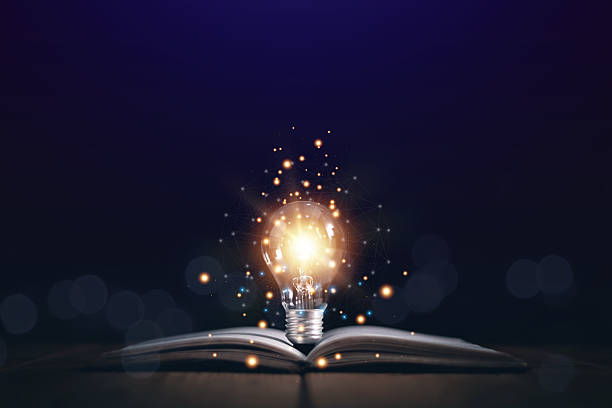 istock Educational knowledge and business education ideas, Innovations, Glowing light bulb on a book, self-learning, Inspiring from read concept, knowledge and searching for new ideas. Thinking for new idea. 2243108278