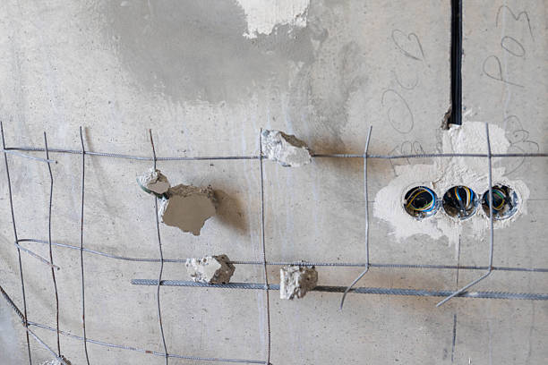 istock electrical sockets and switches are installed on a rustic concrete 2243109945