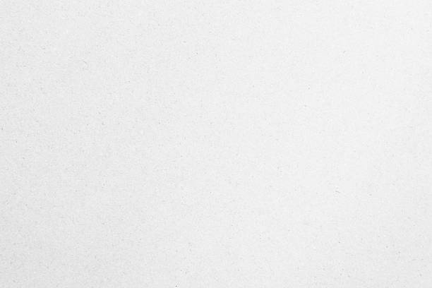istock White recycled craft paper texture as background. Grey paper texture, Old vintage page or grunge vignette of old newspaper. Pattern rough art creased grunge letter. Hardboard with copy space for text. 2243111977