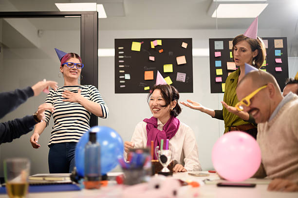 istock Celebrating teamwork and creativity at a business gathering with colorful decorations and fun activities in an office setting 2243112307
