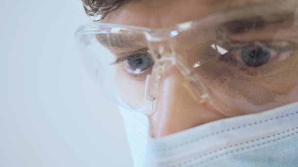 istock Dental Professional in Protective Gear Emphasizing Safety Protocols 2243112522