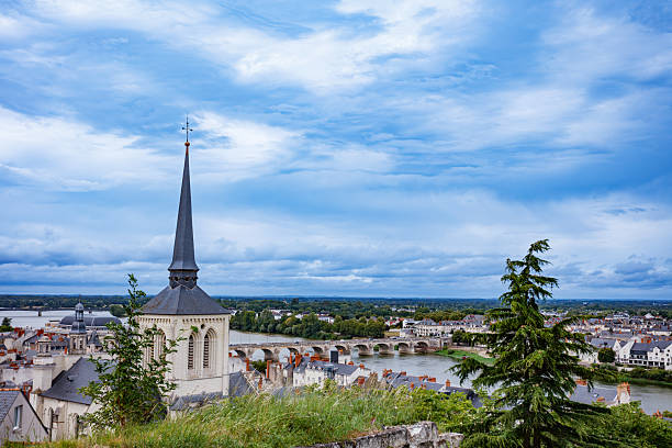 The village of Candes sur Beuvron, between Blois and Orleans, France. The river below is le Beuvron, a subsidiary of the mighty Loire, which it flows into one kilometre downstream.
