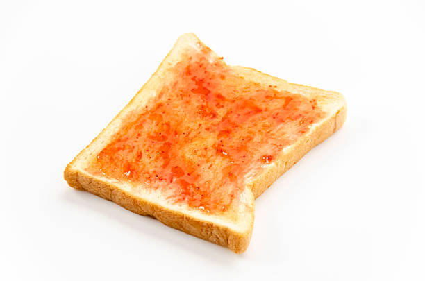 Sliced peanut butter and jelly sandwich closeup