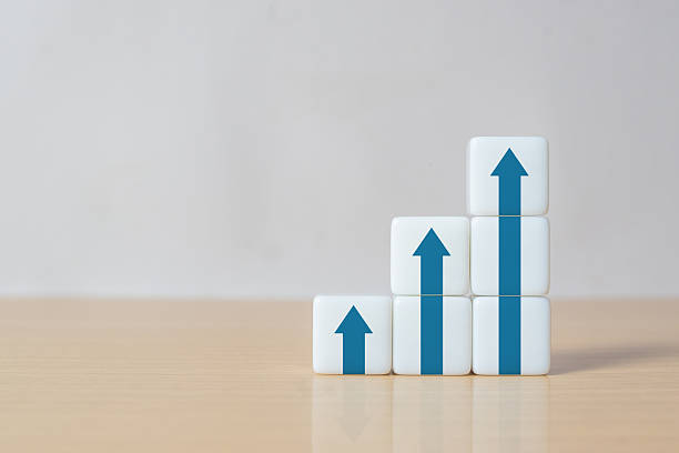 istock Ladder career path for business growth success process concept. Dice stacking as step stair with arrow up 2243115630