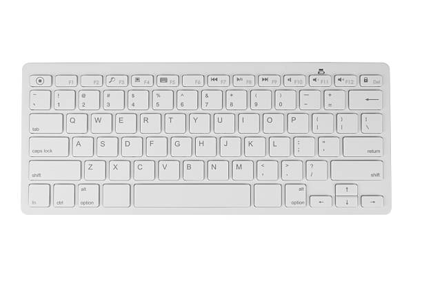 istock Minimalist wireless white keyboard with QWERTY layout photographed from above on a clean background. 2243117947