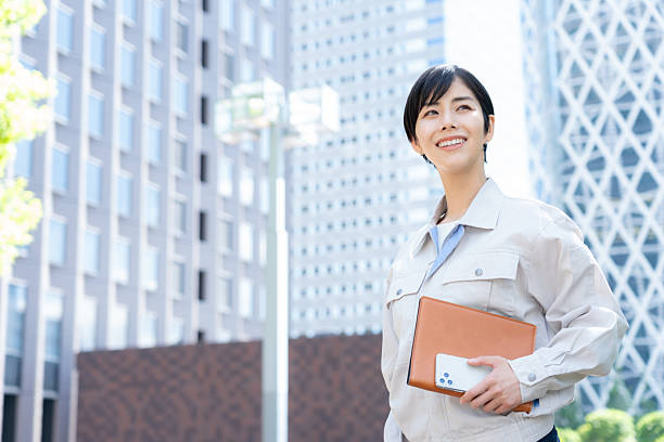 istock businesswoman working in an office district 2243129194