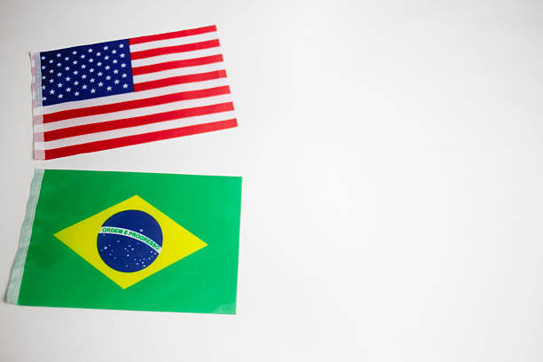 istock Brazil and United States flags in white background with copy space 2243132266