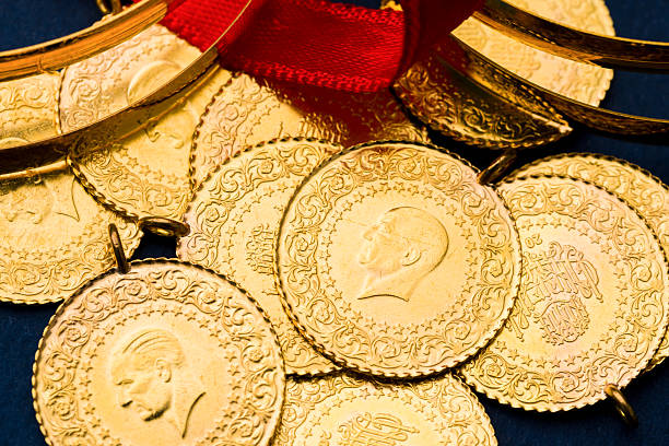 istock Traditional Turkish half gold coins and bracelets symbolizing wealth and prosperity 2243149021