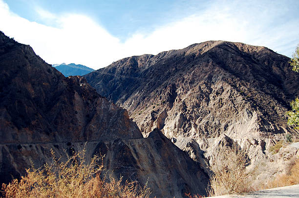 istock Mountainous landscape with rugged terrain and clear sky 2243169158