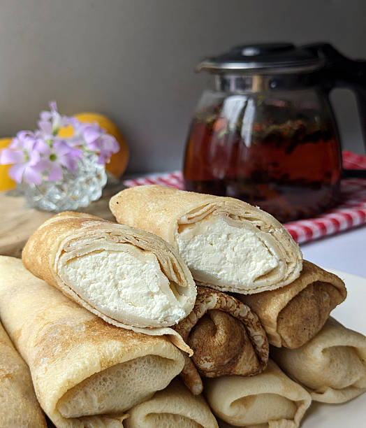 istock Food photography. Thin pancakes with fillings 2243170764