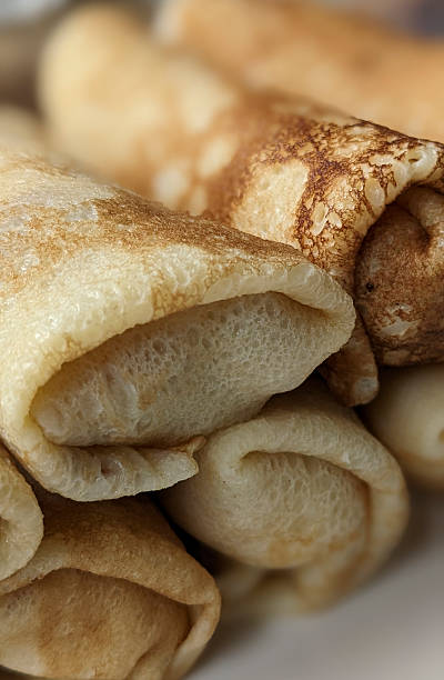 istock Food photography. Thin pancakes with fillings 2243170904