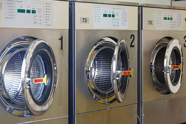 istock Opened washing machines in the laundry room 2243178245
