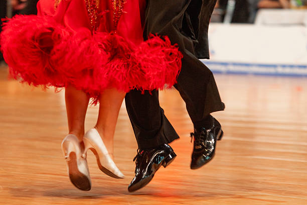 A close-up image of a man's samba shoes