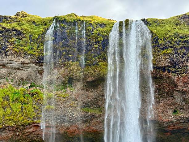istock Seljalandsfoss Waterfall, South Iceland, Famous for Walking Behind the Falls 2243184269